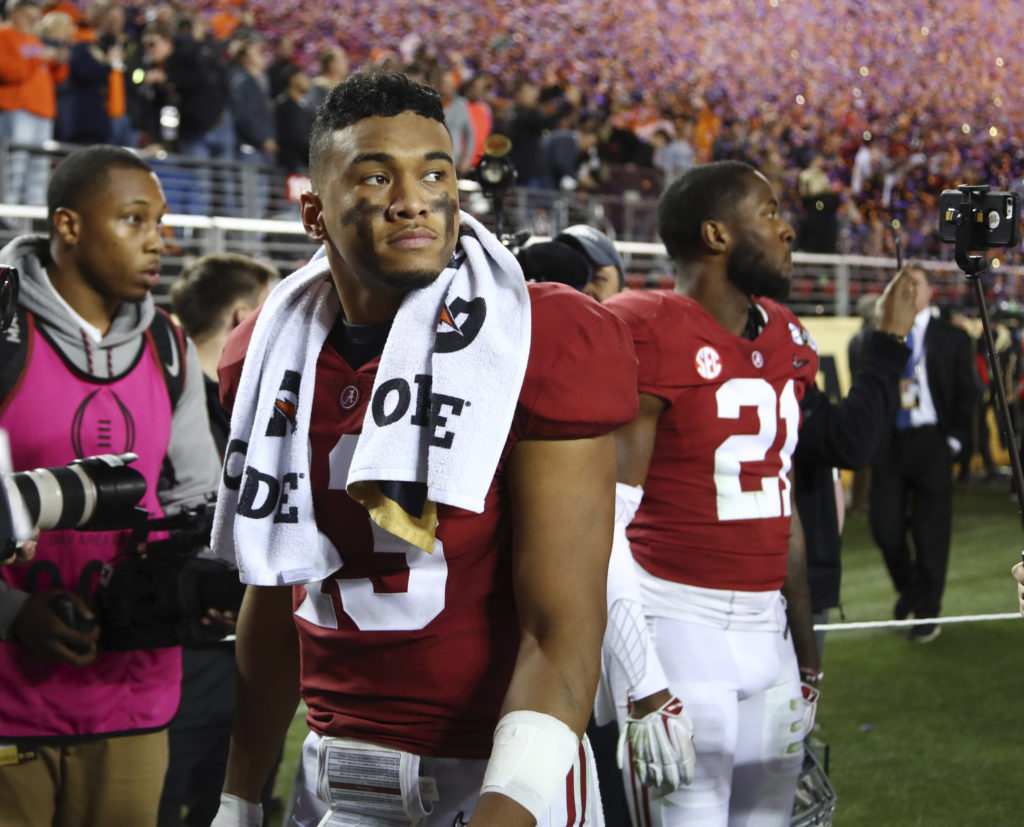 Tua looking like “Alabama Tua” with that red practice jersey 